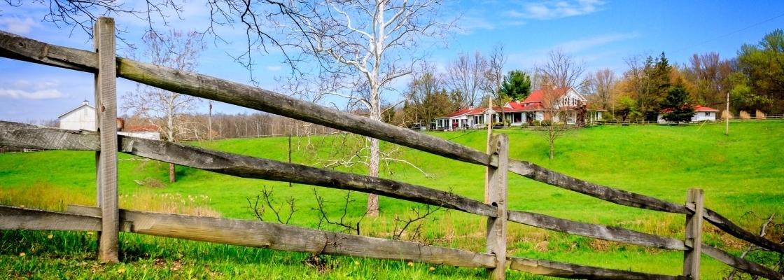 Fence with house behind